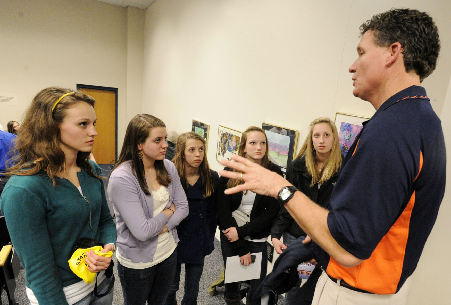 Elite swimmers help local kids improve